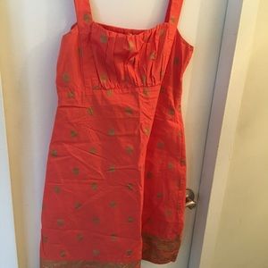 An orange and gold dress size 4